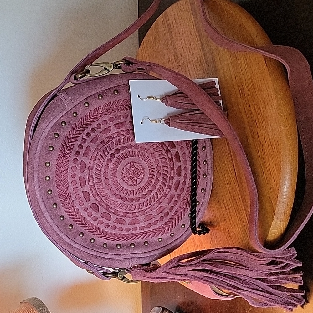 Beautiful wine colored suede crossbody purse w/7" tassel & 3 1/2" earrings.